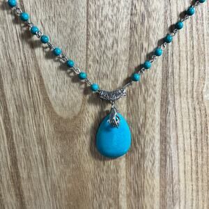 Turquoise colored Howlite Necklace Teardrop Cabochon with silver hand & Heart